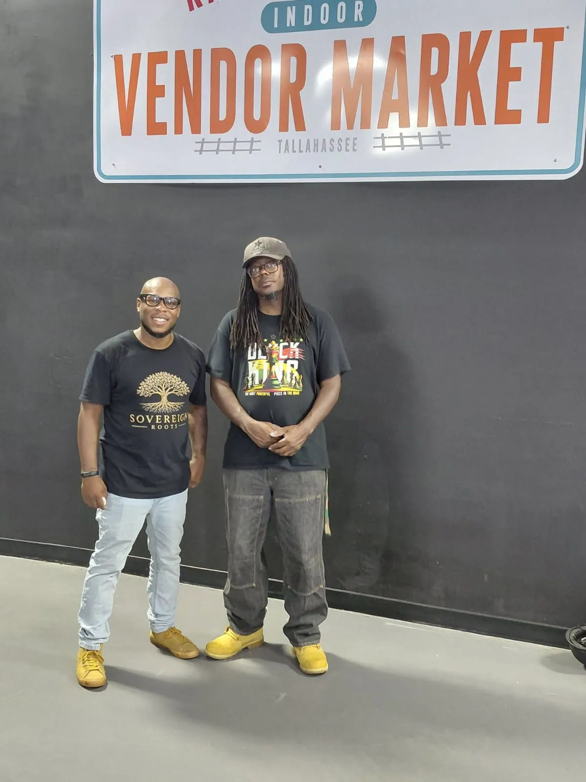 Two adults at a community vendor market